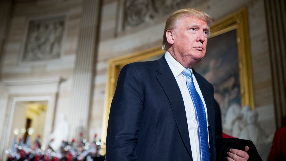 Donald Trump leaves a Congressional Gold Medal in the Capitol's rotunda on March 24, 2015. (Photo by Tom Williams/CQ Roll Call/Getty)