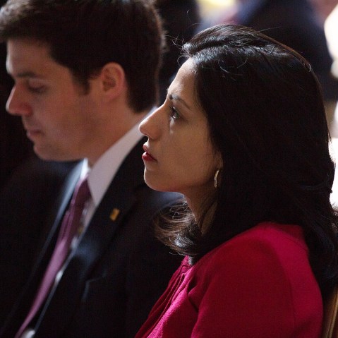 Clinton aide Huma Abedin watches as Secretary of State Hillary Clinton speaks at Columbia University April 29, 2015 in New York City. (Photo by Kevin Hagen/Getty)