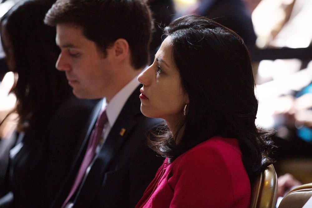Clinton aide Huma Abedin watches as Secretary of State Hillary Clinton speaks at Columbia University April 29, 2015 in New York City. (Photo by Kevin Hagen/Getty)