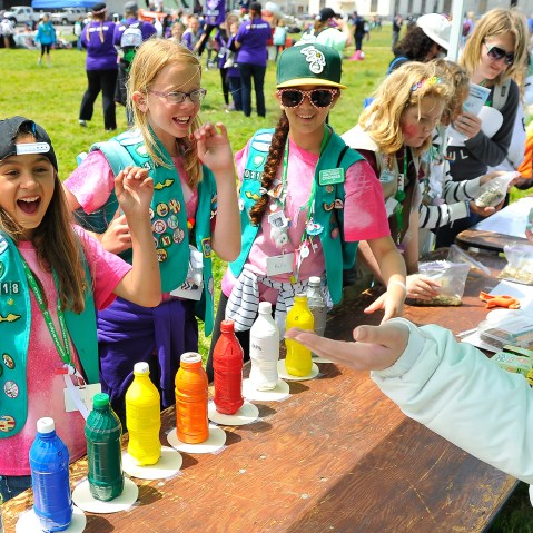 Girl Scouts enjoy ceremony activities at the Girl Scouts of the USA and National Park Service Host a Girl Scout Bridging Ceremony on May 2, 2015 in San Francisco, Calif. (Photo by Steve Jennings/Getty)