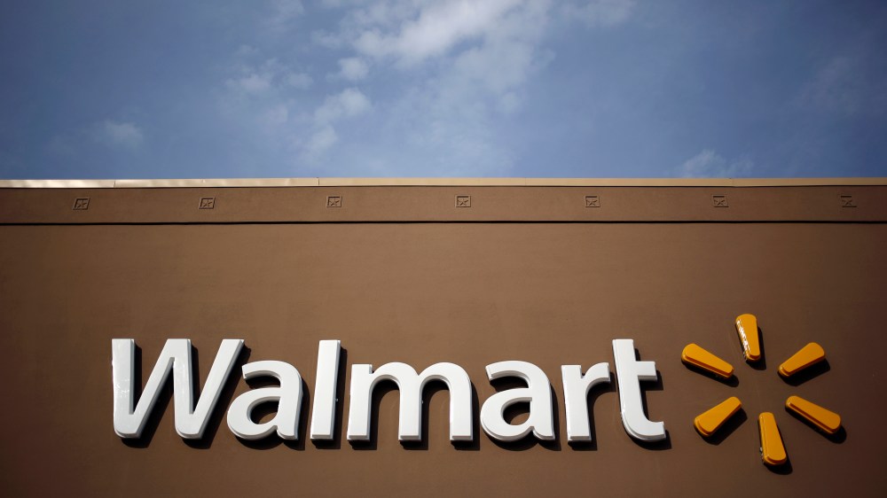 Wal-Mart Stores Inc. signage is displayed outside of a store in Louisville, Ky., May 15, 2015. (Photo by Luke Sharrett/Bloomberg/Getty)