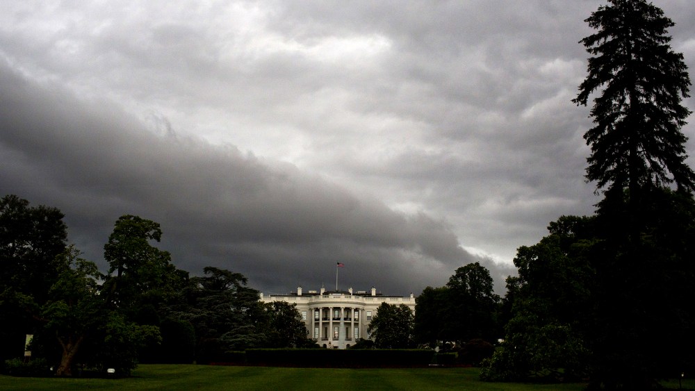 The White House is seen under dark rain clouds in Washington, DC, on June 1, 2015. (Photo by Andrew Caballero-Reynolds/AFP/Getty)