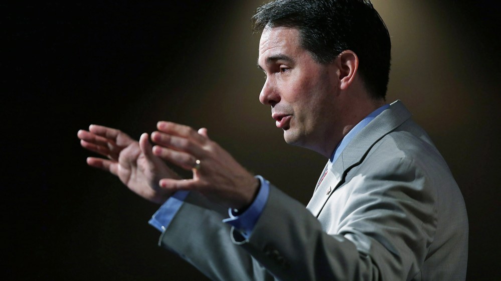 Wisconsin Governor Scott Walker and possible Republican presidential candidate speaks during the Rick Scott's Economic Growth Summit held at the Disney's Yacht and Beach Club Convention Center on June 2, 2015 in Orlando, Fla. (Photo by Joe Raedle/Getty)