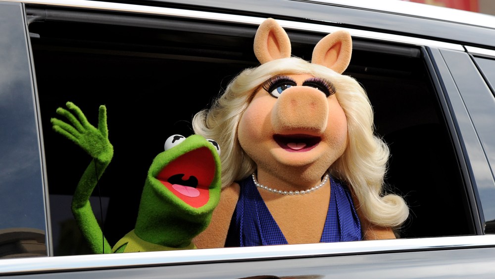 Kermit the Frog (L) and Miss Piggy arrive at the premiere of Disney's "Muppets Most Wanted" at the El Capitan Theatre on March 11, 2014 in Los Angeles, California. (Photo by Kevin Winter/Getty)