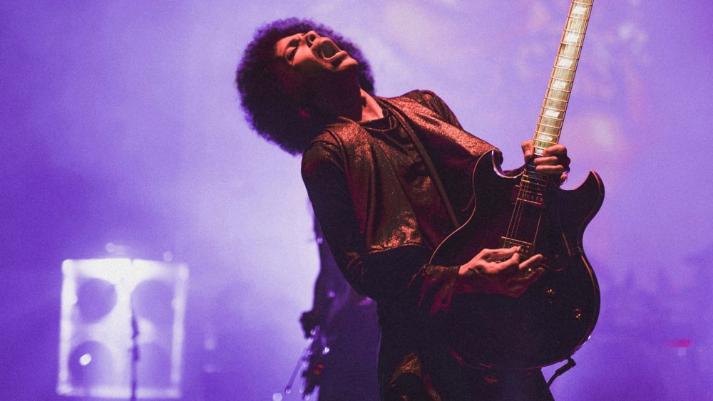 Prince performs onstage at Warner Theatre on June 14, 2015 in Washington, DC. (Photo by Karrah Kobus/NPG Records/Getty)
