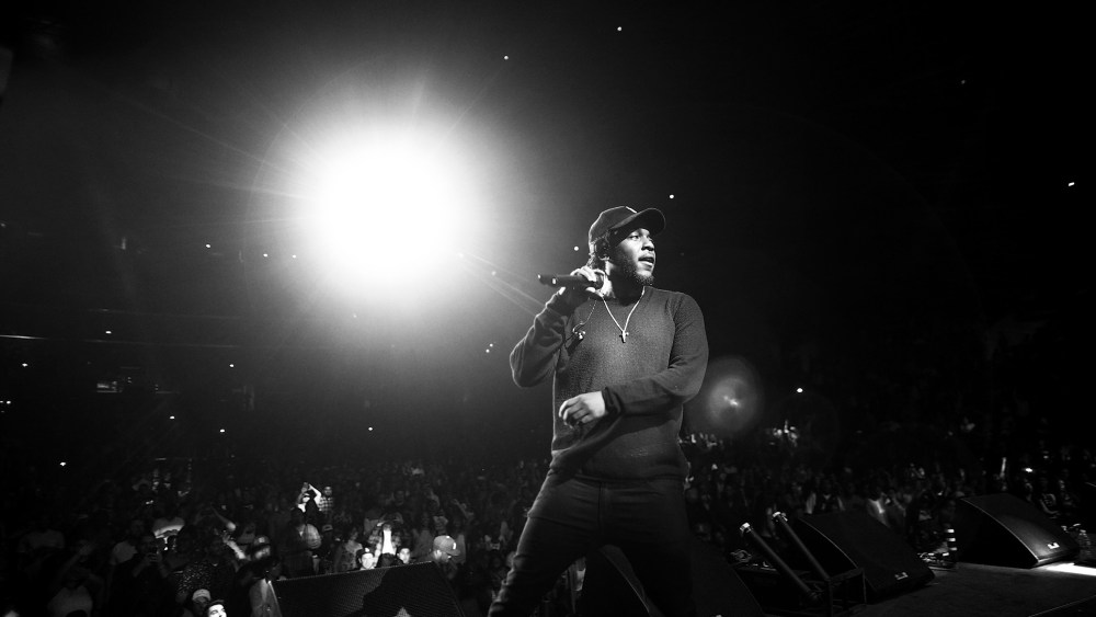 Hip hop artist Kendrick Lamar performs onstage during the Ice Cube, Kendrick Lamar, Snoop Dogg, Schoolboy Q, Ab-Soul, Jay Rock concert at Staples Center on June 27, 2015 in Los Angeles, Calif. (Photo by Christopher Polk/BET/Getty for BET)