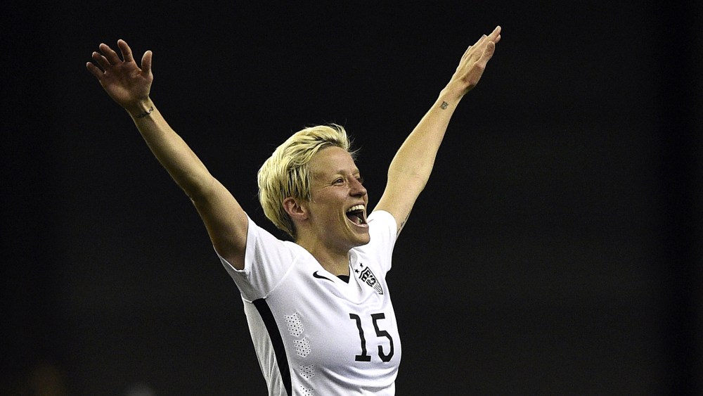 USA midfielder Megan Rapinoe celebrates after winning the semi-final football match between USA and Germany during their 2015 FIFA Women's World Cup at the Olympic Stadium in Montreal on June 30, 2015. (Photo by Franck Fife/AFP/Getty)