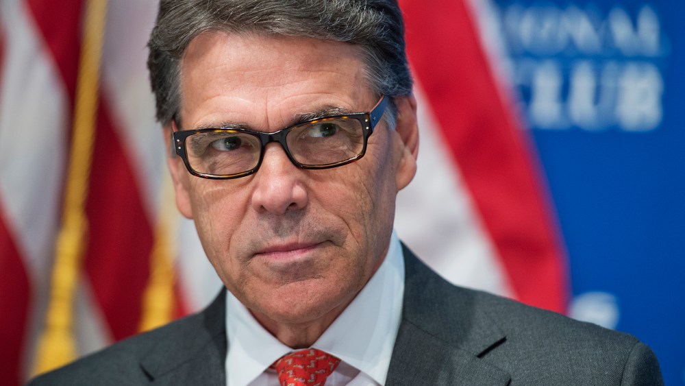 Former Gov. Rick Perry prepares to address the National Press Club's Newsmaker Luncheon on his economic plan on July 2, 2015. (Photo by Tom Williams/CQ Roll Call/Getty)