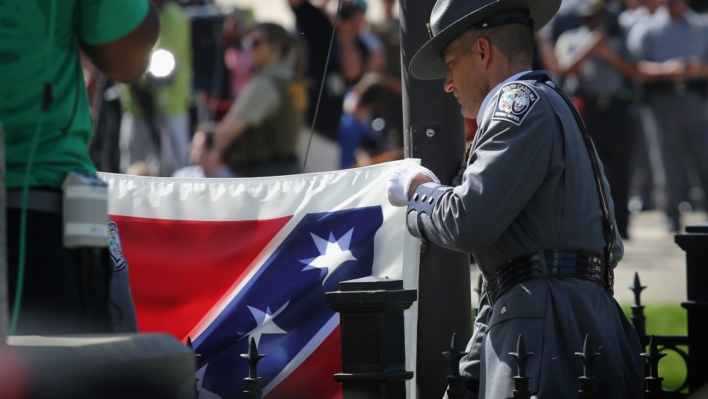 Confederate Flag removed from South Carolina Statehouse grounds on July 10, 2015 in Columbia, South Carolina (Photo by John Moore/Getty).