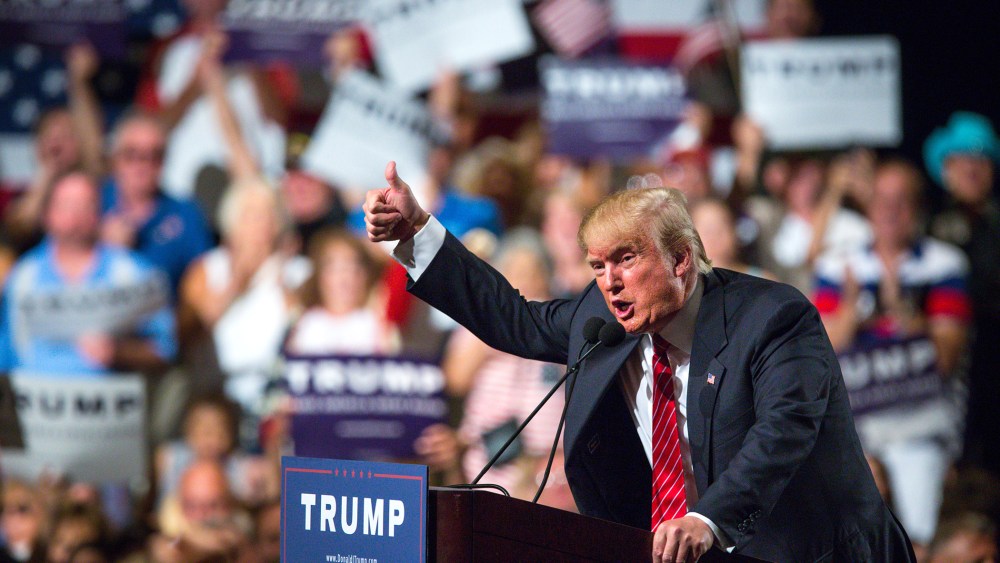 Republican Presidential candidate Donald Trump addresses supporters during a political rally at the Phoenix Convention Center on July 11, 2015 in Phoenix, Ariz. (Photo by Charlie Leight/Getty)