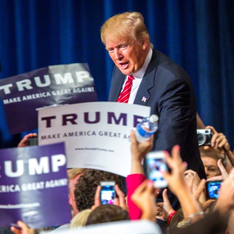 Republican Presidential candidate Donald Trump addresses supporters during a political rally at the Phoenix Convention Center on July 11, 2015 in Phoenix, Ariz. (Photo by Charlie Leight/Getty)