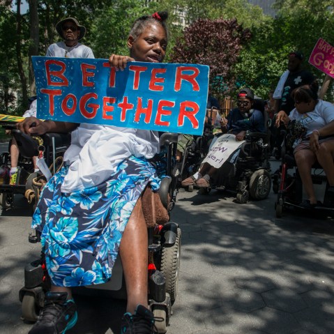 People participate in the first annual Disability Pride Parade on July 12, 2015 in New York City. (Photo by Stephanie Keith/Getty)