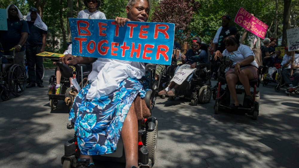 People participate in the first annual Disability Pride Parade on July 12, 2015 in New York City. (Photo by Stephanie Keith/Getty)