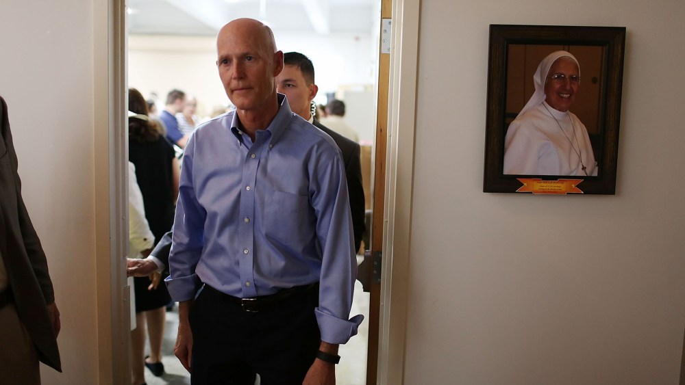 Florida Governor Rick Scott visits the Marian Center which offers services for people with intellectual disabilities on July 13, 2015 in Miami Gardens, Fl. (Photo by Joe Raedle/Getty)