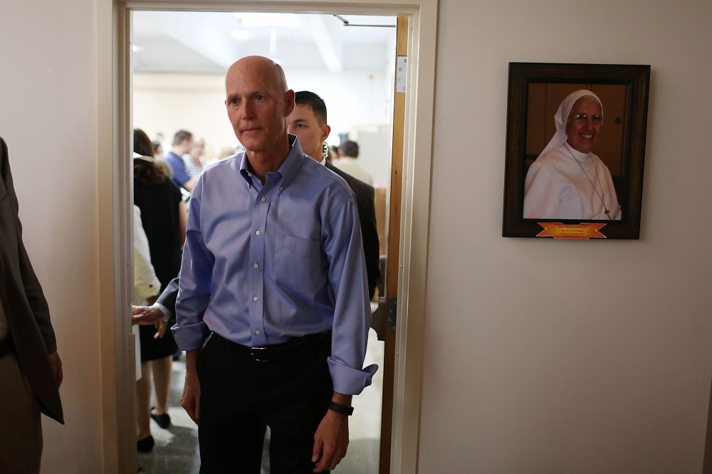 Florida Governor Rick Scott visits the Marian Center which offers services for people with intellectual disabilities on July 13, 2015 in Miami Gardens, Fl. (Photo by Joe Raedle/Getty)