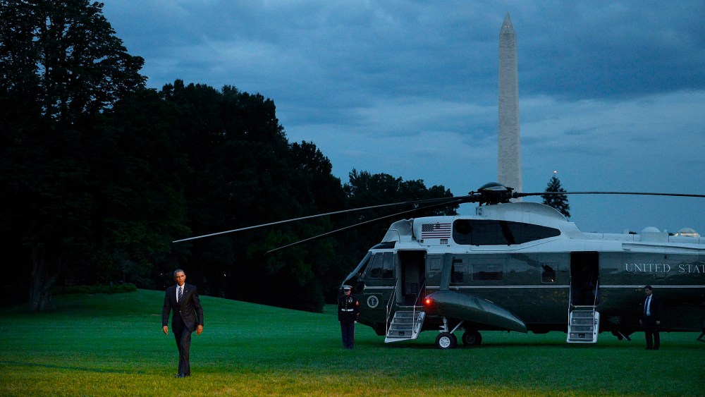President Barack Obama walks back to the residence after returning to the White House July 14, 2015 in Washington, D.C. (Photo by Olivier Douliery/Pool/Getty)