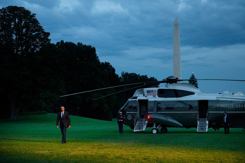 President Barack Obama walks back to the residence after returning to the White House July 14, 2015 in Washington, D.C. (Photo by Olivier Douliery/Pool/Getty)