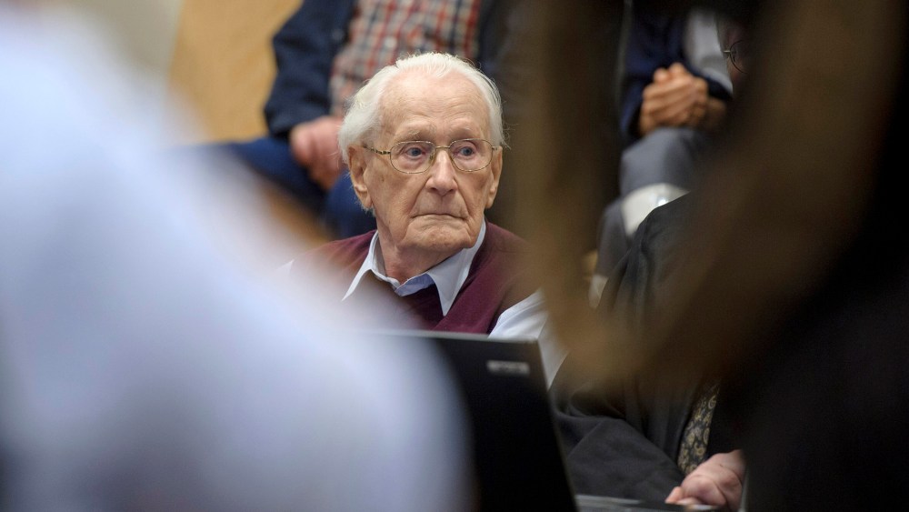 Oskar Groening, 94, a former member of the Waffen-SS who worked at the Auschwitz concentration camp during World War II, awaits the verdict in his trial on July 15, 2015 in Lueneburg, Germany. (Photo by Hans-Jurgen Wege/Pool/Getty)