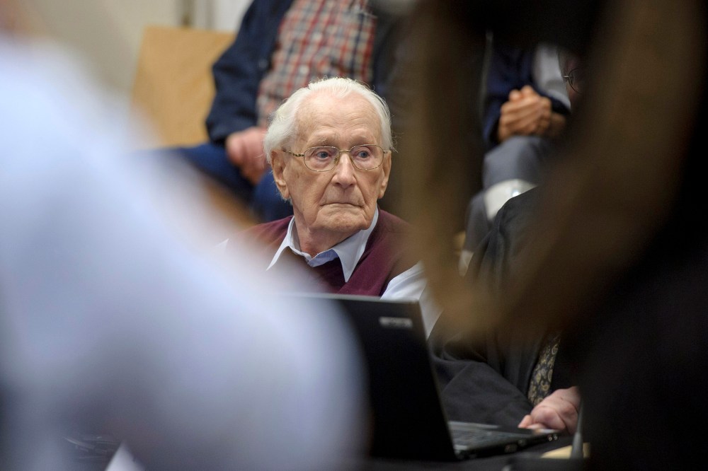 Oskar Groening, 94, a former member of the Waffen-SS who worked at the Auschwitz concentration camp during World War II, awaits the verdict in his trial on July 15, 2015 in Lueneburg, Germany. (Photo by Hans-Jurgen Wege/Pool/Getty)