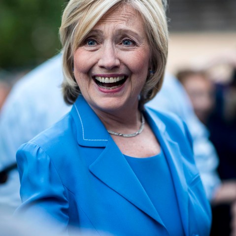 Secretary Hillary Clinton greets voters at a house party in Windham, N.H. (Photo by Melina Mara/The Washington Post/Getty).