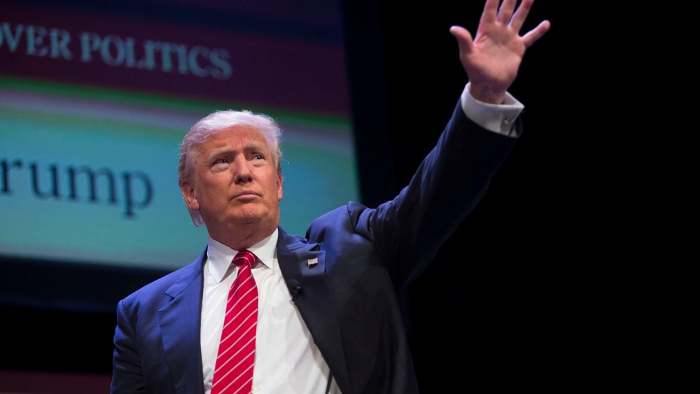 Donald Trump waves after speaking at The Family Leadership Summit in Ames, Iowa (Photo by Daniel Acker/Bloomberg via Getty).