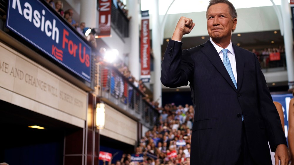John Kasich, governor of Ohio, gestures while arriving to announce he will seek the 2016 Republican presidential nomination in Columbus, Ohio, on July 21, 2015. (Photo by Luke Sharrett/Bloomberg/Getty)