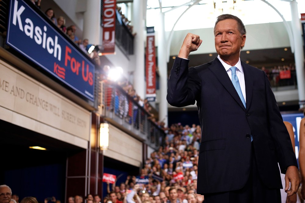 John Kasich, governor of Ohio, gestures while arriving to announce he will seek the 2016 Republican presidential nomination in Columbus, Ohio, on July 21, 2015. (Photo by Luke Sharrett/Bloomberg/Getty)