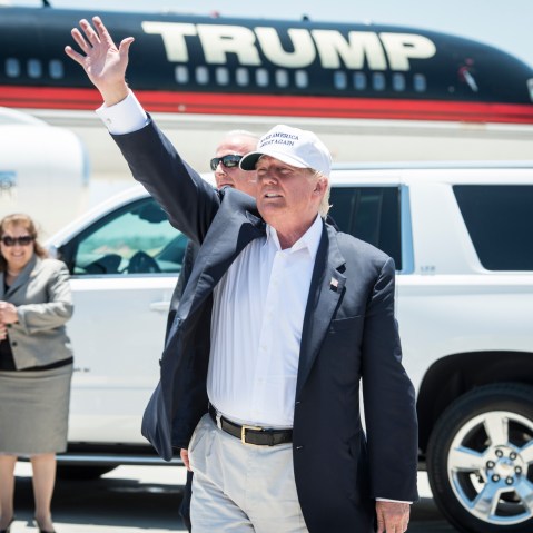Republican Presidential candidate and business mogul Donald Trump exits his plane during his trip to the border on July 23, 2015 in Laredo, Texas. (Photo by Matthew Busch/Getty)