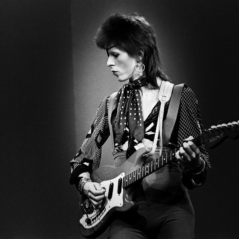 David Bowie, with eye patch, performs 'Rebel Rebel' in the Top Pop Studios, Hilversum, Netherlands on Feb. 13 1974. (Photo by Gijsbert Hanekroot/Redferns/Getty)