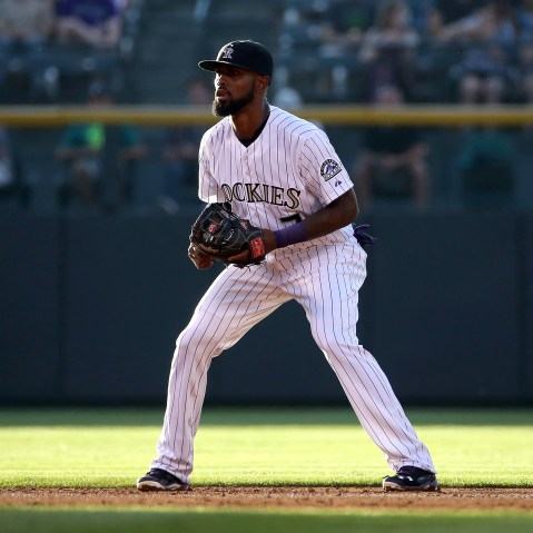 Shortstop Jose Reyes #7 of the Colorado Rockies plays defense during a game on Aug. 4, 2015 in Denver, Colo. (Photo by Doug Pensinger/Getty)