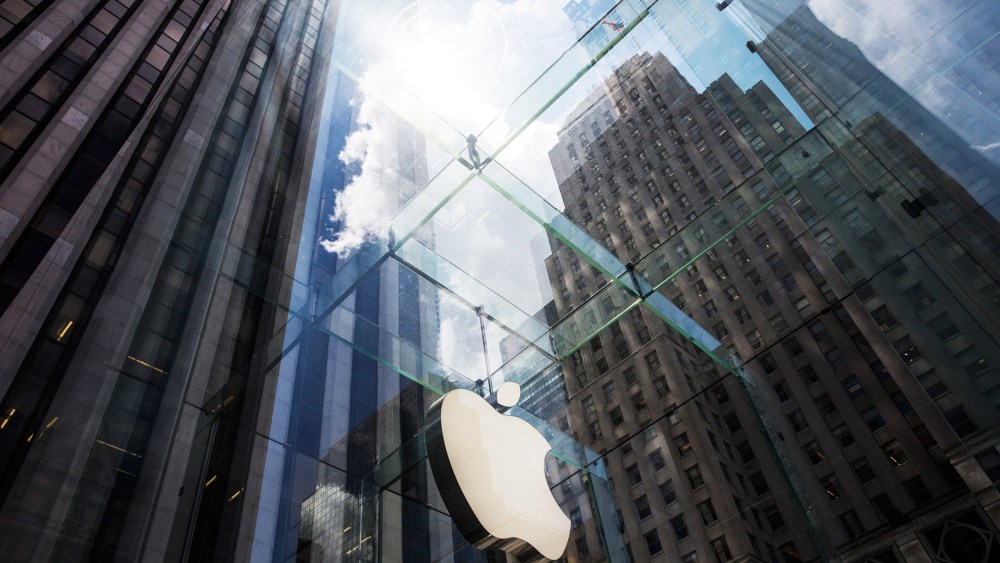 The Apple logo hangs on the Apple Store on Fifth Avenue on Aug. 5, 2015 in New York, N.Y. (Photo by Andrew Burton/Getty)