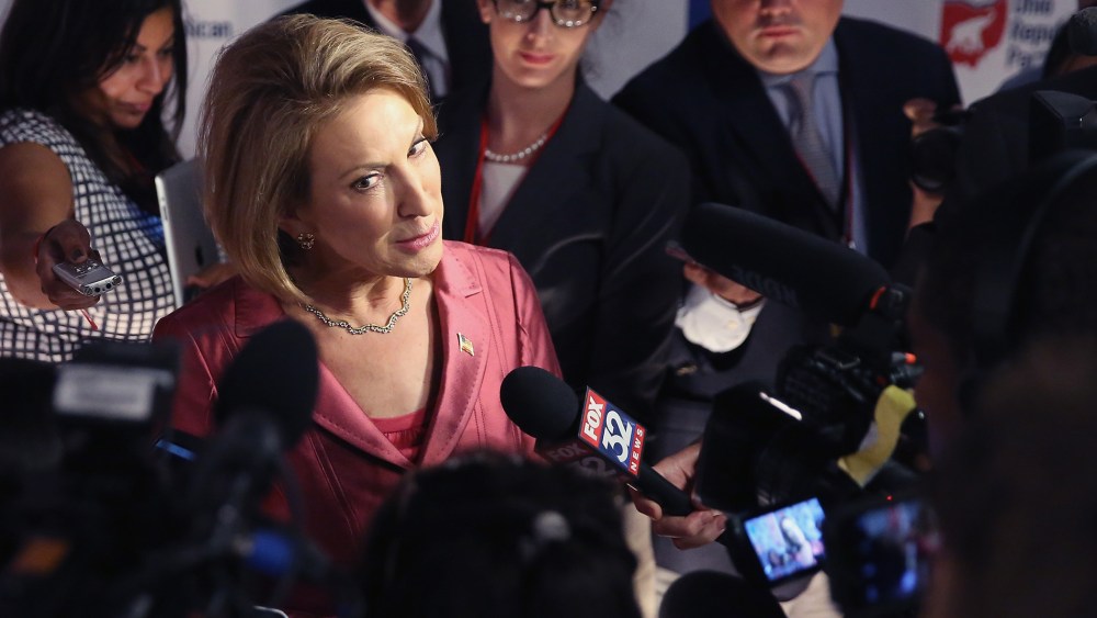 Republican presidential candidate Carly Fiorina fields questions from the press following the “happy hour” debate hosted by Fox News at the Quicken Loans Arena August 6, 2015 in Cleveland, OH. (Photo by Scott Olson/Getty)