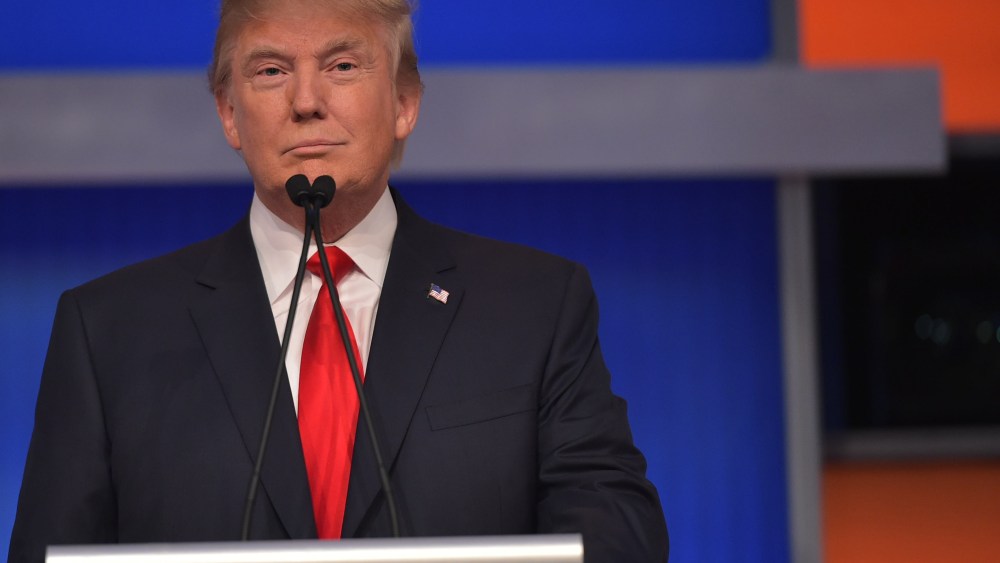 Real estate tycoon Donald Trump participates in the first Republican presidential primary debate on Aug. 6, 2015 at the Quicken Loans Arena in Cleveland, Ohio. (Photo by Mandel Ngan/AFP/Getty)