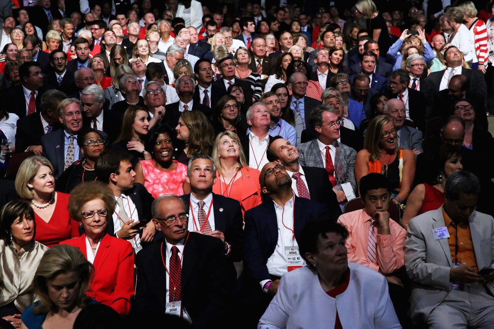 Audience members wait for the start of a Republican presidential debate hosted by FOX News and Facebook at the Quicken Loans Arena August 6, 2015 in Cleveland, Ohio. (Photo by Chip Somodevilla/Getty)
