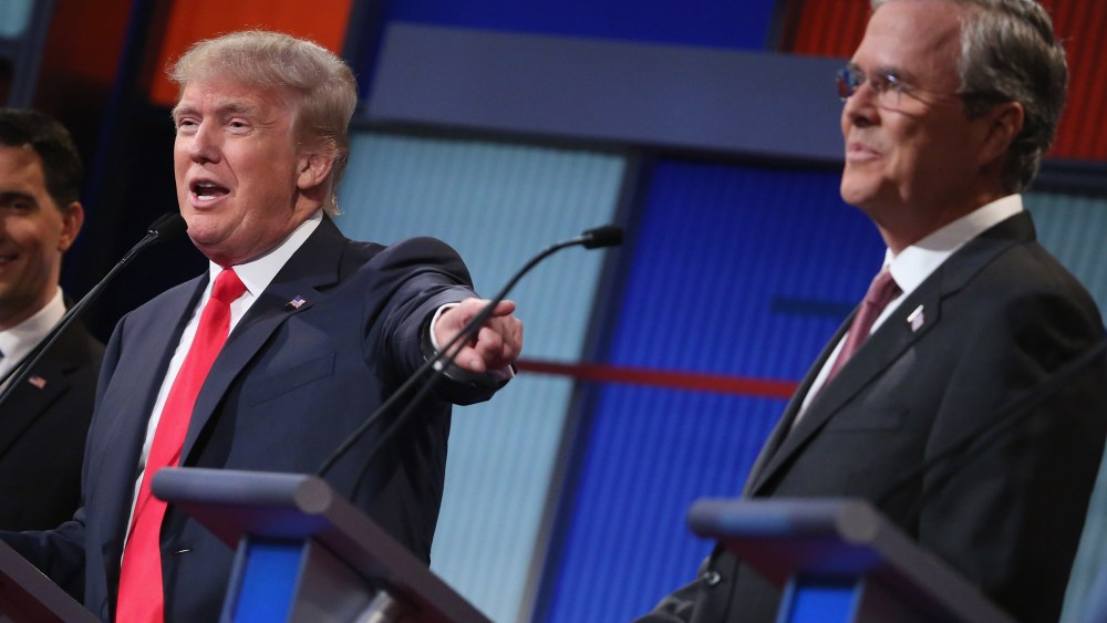 Republican presidential candidates Donald Trump and Jeb Bush participate in the first prime-time presidential debate on Aug. 6, 2015 in Cleveland, Ohio. (Photo by Chip Somodevilla/Getty)