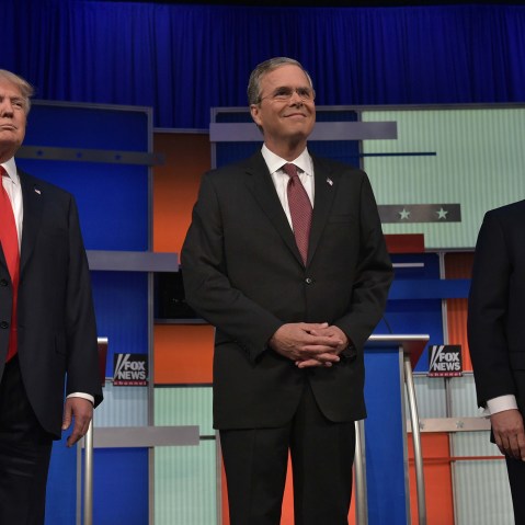 Real estate tycoon Donald Trump, former Florida governor Jeb Bush, and former Arkansas governor Mike Huckabee at Republican debate Aug. 6, 2015. (Photo by Mandel Ngan/ AFP/Getty)