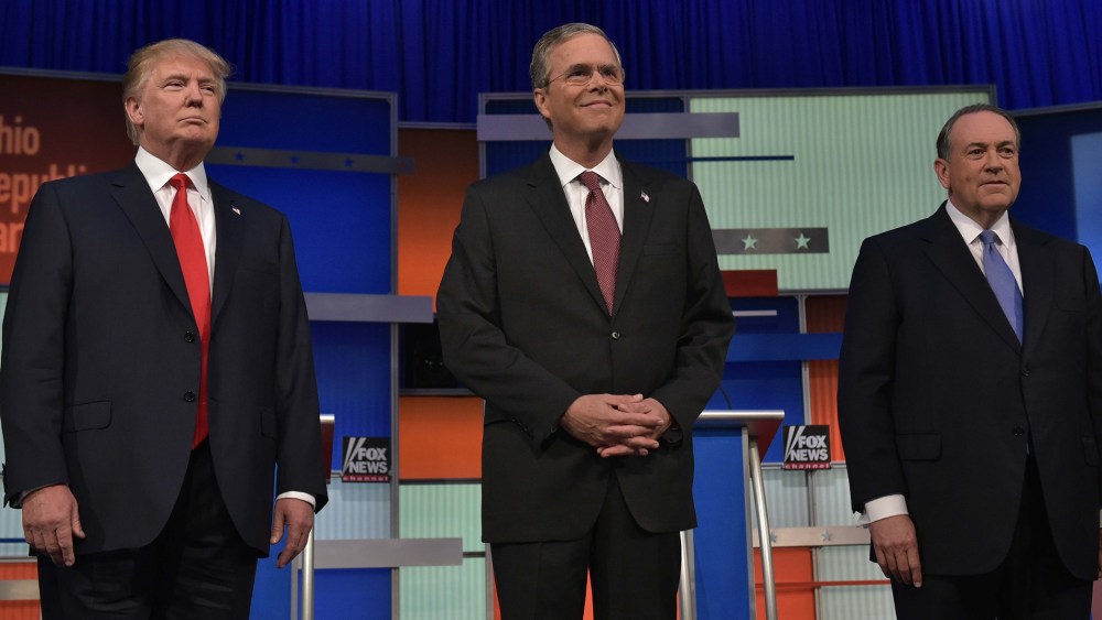 Real estate tycoon Donald Trump, former Florida governor Jeb Bush, and former Arkansas governor Mike Huckabee at Republican debate Aug. 6, 2015. (Photo by Mandel Ngan/ AFP/Getty)
