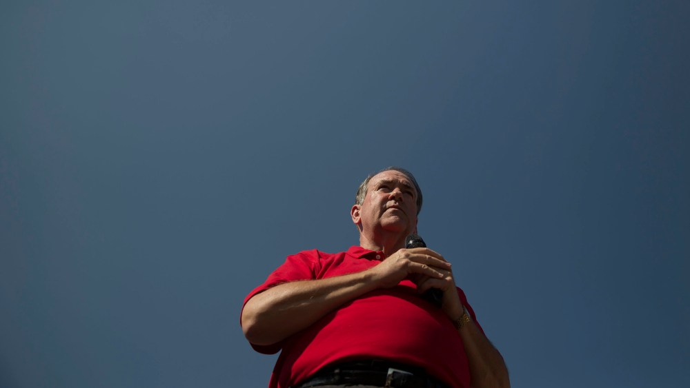 Mike Huckabee, Republican presidential candidate, speaks to attendees at the Iowa State Fair Soapbox in Des Moines, Ia., U.S., Aug. 13, 2015. (Photo by Daniel Acker/Bloomberg/Getty)