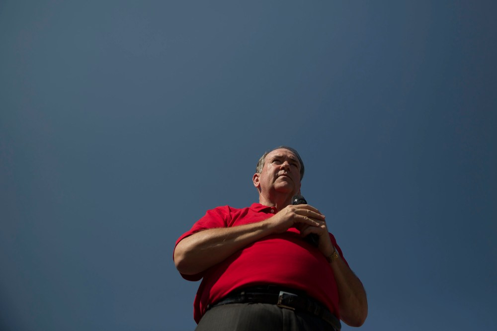 Mike Huckabee, Republican presidential candidate, speaks to attendees at the Iowa State Fair Soapbox in Des Moines, Ia., U.S., Aug. 13, 2015. (Photo by Daniel Acker/Bloomberg/Getty)