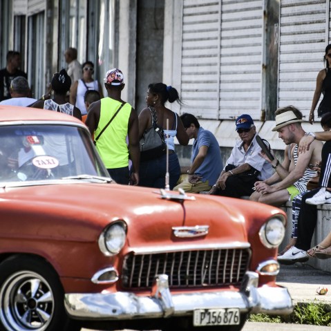 Cubans use internet in a street of Havana, on Aug. 13, 2015. Many Cubans hope that the new relations with the United States will improve the communication with their relatives living abroad. (Photo by Adalberto Roque/AFP/Getty)