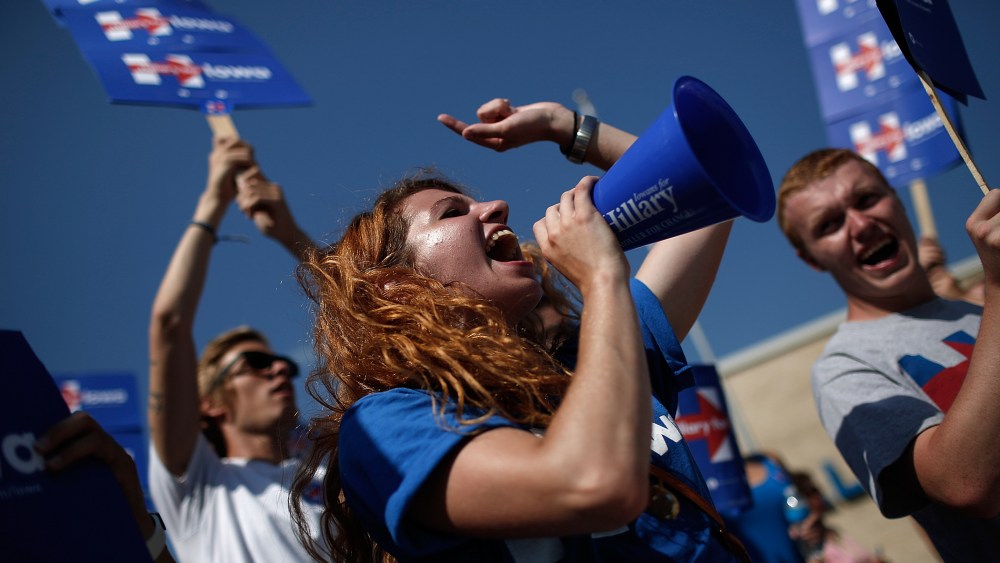 Supporters of Democratic presidential candidate Hillary Clinton rally outside the Iowa Democratic Wing Ding in Clear Lake, Iowa on Aug. 14, 2015 (Photo by Win McNamee/AP).