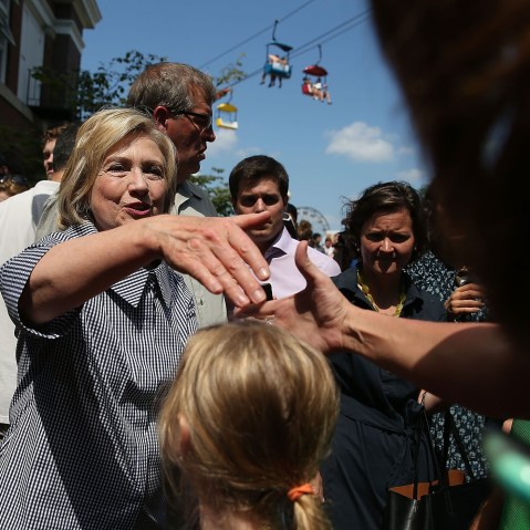 Democratic presidential hopeful Hillary Clinton greets fairgoers as she tours the Iowa State Fair on Aug. 15, 2015 in Des Moines, Ia. (Photo by Justin Sullivan/Getty)