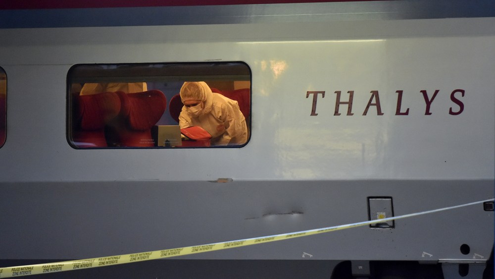 Police inspect the crime scene inside a Thalys train of French national railway operator SNCF at the main train station in Arras, northern France, on Aug. 21, 2015. (Photo by Philippe Huguen/AFP/Getty)