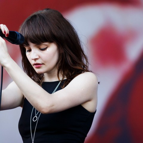 Lauren Mayberry of the Chvrches performs on Day 1 of the V Festival at Hylands Park on Aug. 22, 2015 in Chelmsford, England. (Photo by Tristan Fewings/Getty)