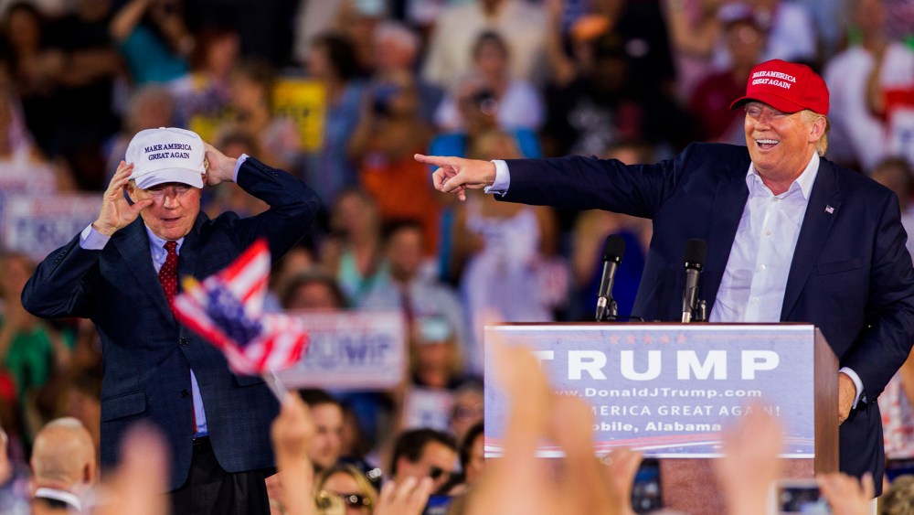 U.S. Republican presidential candidate Donald Trump introduces Alabama Senator Jeff Sessions Mobile during his rally at Ladd-Peebles Stadium on Aug. 21, 2015 in Mobile, Ala. (Photo by Mark Wallheiser/Getty)