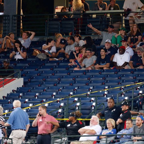 Police block off a section with police tape after a fan fell from the upper deck of Turner Field in the seventh inning during the game between the Atlanta Braves and the New York Yankees on Aug. 29, 2015 in Atlanta, Ga. (Photo by Mike Zarrilli/Getty)