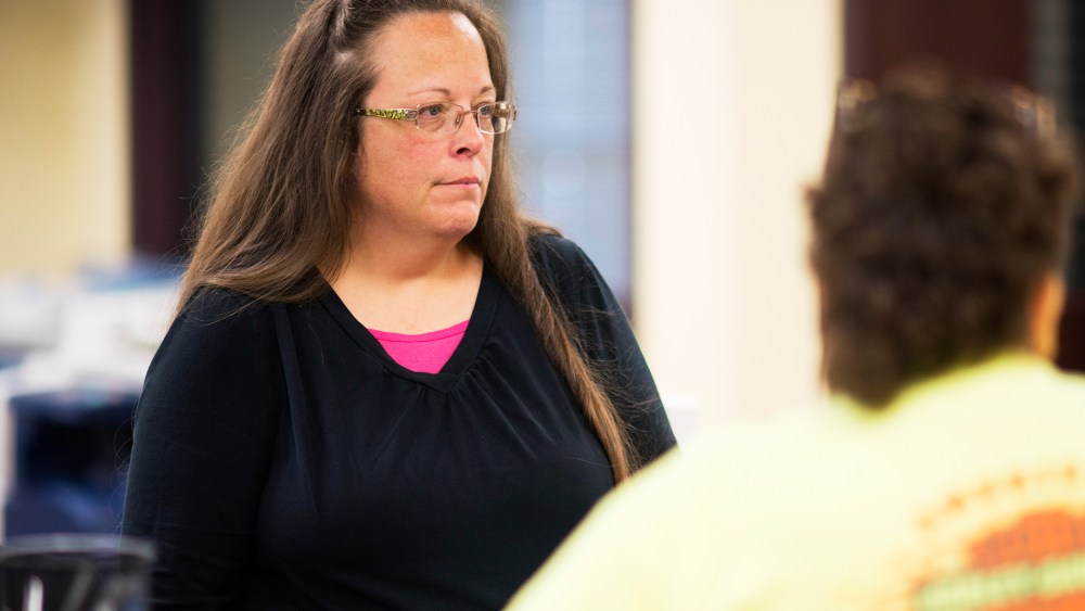 Kim Davis, the Rowan County Clerk of Courts, speaks to coworkers at the County Clerks Office on Sept. 2, 2015 in Morehead, Ky. (Photo by Ty Wright/Getty)