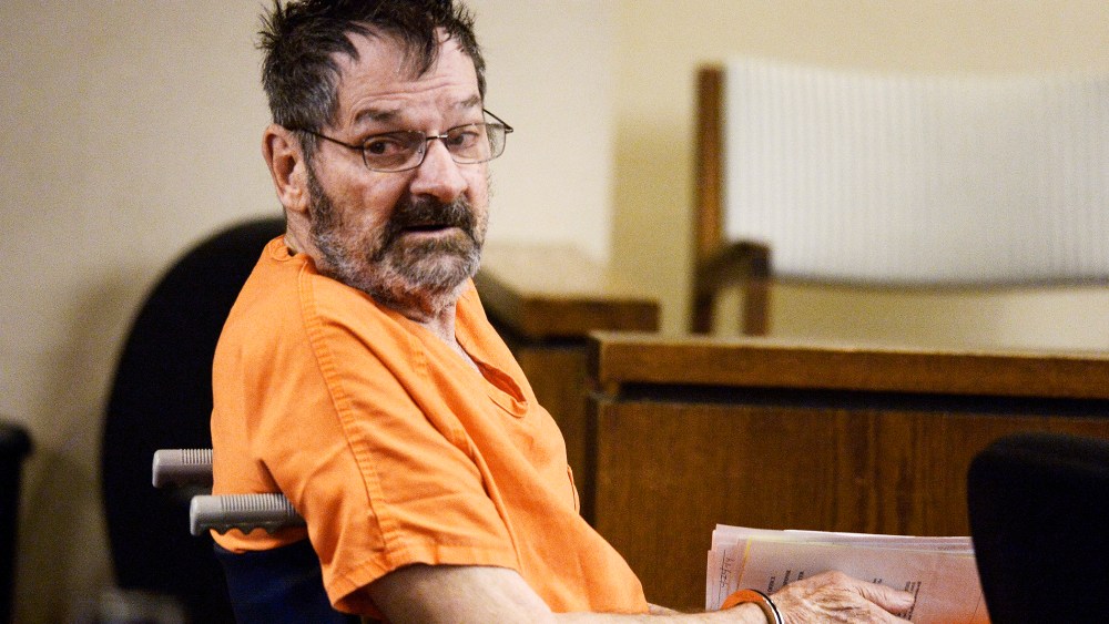 Frazier Glenn Cross, also known as Frazier Glenn Miller, sits with his defense team after being wheeled into a Johnson County courtroom for a scheduling session April 24, 2014, in Olathe, Kanas. (Photo by John Sleezer-Pool/Getty)