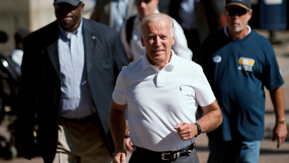 Vice President Joe Biden runs while participating in the annual Allegheny County Labor Day Parade, Sep. 7, 2015 in Pittsburgh, Penn. Biden has been subject of speculation about whether he will run for the U.S. presidency. (Photo by Jeff Swensen/Getty)