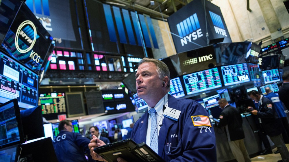 A trader works on the floor of the New York Stock Exchange during the afternoon of Sept. 8, 2015 in New York, N.Y. (Photo by Andrew Burton/Getty)